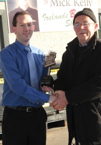 Mick Kelly is congratulated by customer Pat Gilbert after being declared 'Best Shopkeeper' in Ireland on the Ray D'Arcy radio show.