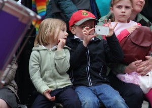 Sarah Jane Bolger and Zachary Gray concentrate on getting their best shot of the drumming display at the Enniscorthy Street Rhythms Dance Festival. Pic: Christy Farrell
