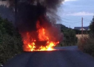 The scene at Doran's Hill, near Ferns, as a car caught fire.