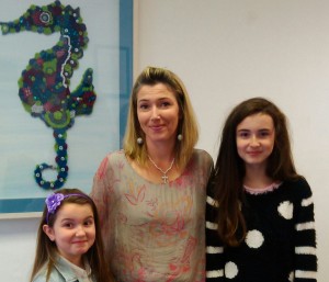 Geraldine Blake with kids, Emily and Gracie Kirkland, at the opening of Market House Fesign.