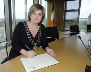 Cllr Barbara Anne Murphy, chairperson of the Enniscorthy Municipal District signing the 'Book of Condolences' for the tragedy in France. Pic: Jim Campbell
