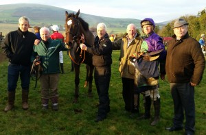 Raymond McGlinchy (green jacket), owner, breeder and trainer of 'The Bishop', winner of the geldings maiden race at Fairwood, Tinahely, today, and one of three winners for jockey Jamie Codd.