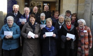 Cheques were presented to St Vincent de Paul (20,000), Ozanam House Men's Hostel (6,000), South East Radiotherapy Trust (6,000), Family Life Services, Wexford (6,000), Wexford Women's Refuge (5,000), Irish Cancer Research (1,000), Simon Community Waterford (1,000) in St Iberius Church proceeds from the Four Day Charity Christmas Fast 2014. Pictured are back- Peter Hudson, Tom O'Connor, Canon Arthur Minion, Sue McMahon, Fr Jim Fegan, Susan Minion, Georgina Rothwell, Nuala Williamson, Linda Williamson. Front- Anne Keenan, Ben Doyle, Theresa Hanrahan, Niamh Tierney, Claire Verdon. Pic: Jim Campbell