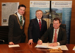 Cllr John Hegarty, Minister Brendan Howlin and Cllr Malcolm Byrne are pictured at the signing of contracts for works to be carried out in Courtown Harbour. Pic: Christy Farrell