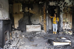 A devastated Bernadette Burae pictured inside the livingroom of her house in Clonard Village which was gutted by fire. Pic: Jim Campbell