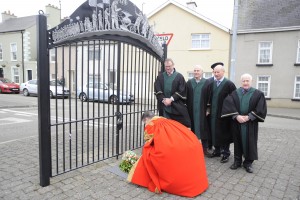 Mayor Cllr George Lawlor pictured laying a wreath a the 'Lock Out Gate'. Pic: Jim Campbell