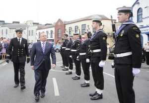 Minister Brendan Howlin TD inspects the Navy personal at the laying of wreaths at the Commodore Barry Memorial. Pic: Jim Campbell
