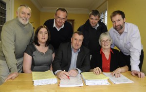 Pictured at the signing of contracts for the alterations and extension to the New Ross Community Hospital were Jim Collins (Vice Chairman Board), Adam Hall (Adam Hall Architecture), Owen Leacy (Mythen Construction), Alan Morrissey (Project manager). Front- Laura Collins (Director of Nursing), Maurice Mythen (Mythen Construction), Frances Ryan (Chairman Board). Pic: Jim Campbell