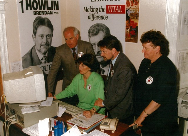 Another election, another campaign: Brendan Howlin is flanked by his director for elections, Ted Howlin, and Labour supporters Marian Doyle and Mary Fallon.