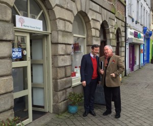 Sen. Michael Darcy and Harry Crosbie discussing future plans for Gorey Market House.