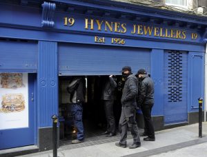 Security men with their faces covered entered Hynes Jewellers on the Main Street. Pic: Jim Campbell