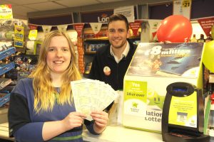 Plenty of smiles from winning ticket seller Erin Dooley and proprietor Michael Hanrahan at the lotto machine in Hanrahan's Londis, The Faythe. Pic: Jim Campbell