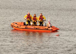 Members of the Wexford Lifeboat pay tribute to Coast Guard volunteer Caitriona Lucas by laying a wreath in Wexford harbour. Pic: Christy Farrell